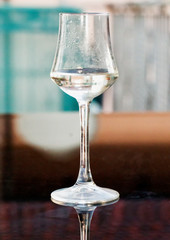 White liquor in small glass