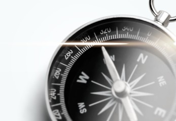 Brass antique compass  on background