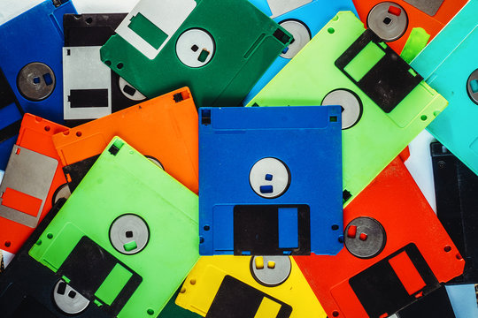 floppy disks background in the different colors