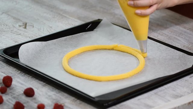 Eclair rings baking process. Making Paris Brest.