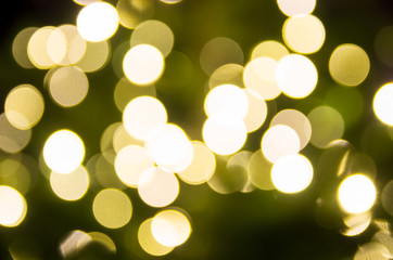 Obraz premium yellow Christmas lights in defocus; christmas background