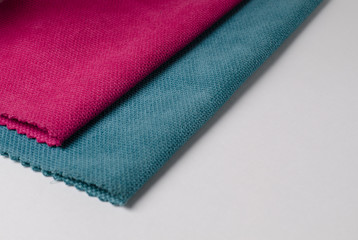 Bright collection of colorful velour textile samples. Fabric texture background