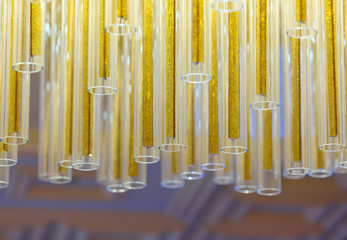Fototapeta na wymiar Colorful hanging tubes made of glass.
