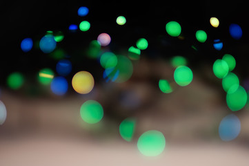 Abstract bokeh background. The lights are out of focus.