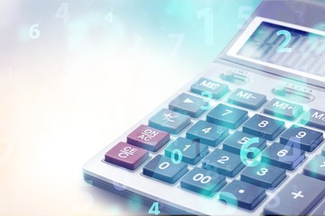 Calculator isolated on background, close up