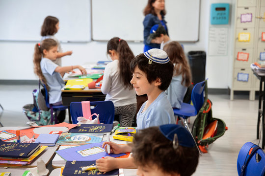 Smiling boy in classroom