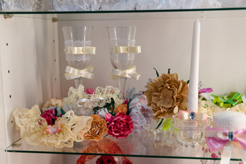 Photo wedding garter to decorate the bride. Accessory for the wedding. The bride puts it on her leg, then the groom removes it.