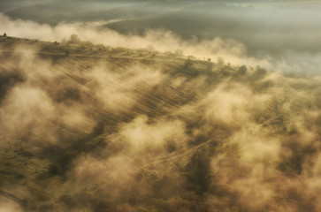 foggy canyon of a picturesque river. spring dawn