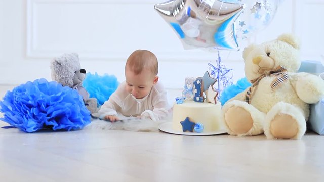 Little boy one year old in photo studio
