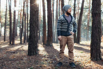 Outdoor portrait of handsome bearded man . Casual autumn fashion portrait