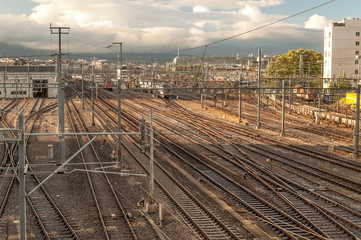 Fototapeta na wymiar Train tracks in the Swiss city of Geneva on a cloudy day