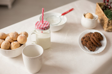 new year mood. glass of milk. cookie. Christmas gingerbread. gingerbread with milk