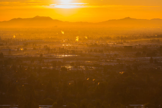 Dawn Sunburst View Towards Griffith Park And North Hollywood In The San Fernando Valley Area Of Los Angeles, California.  