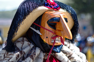 Mask and dancer of the Huaconada in Mito, Concepción