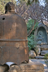 Ancient Bell and Shrine in Meditation Garden