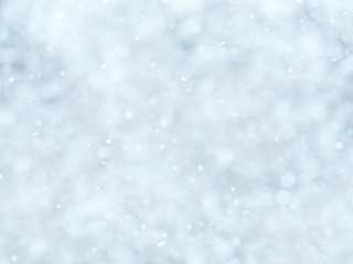Snowing. Abstract soft natural winter background, focus on falling snowflakes