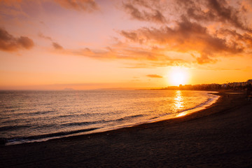 Sunset. Mediterranean Sea Sunset at Costa del Sol beach. Estepona, Malaga, Andalusia, Spain.