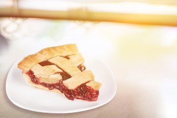 Delicious baked cherry pie isolated on white background
