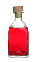 Glass bottle with wine vinegar on white background