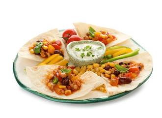 Plate of tortillas with chili con carne on white background