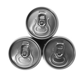 Top view of aluminum cans with beverage on white background