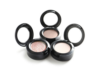 Different eye shadows on white background. Decorative cosmetics