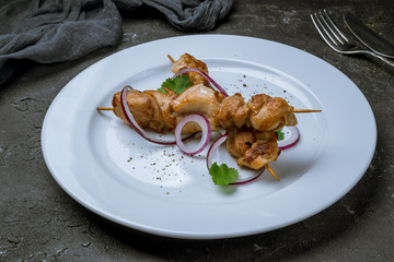 chicken kebab on board