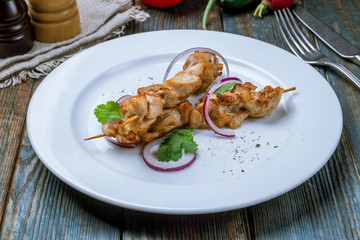 chicken kebab on board