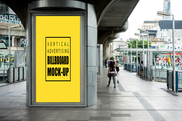 Mock up vertical billboards on poles in the public walkway