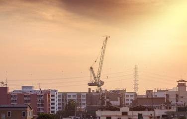 Fototapeta na wymiar Construction site with cranes against