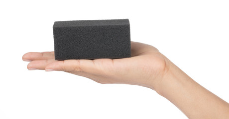 Hand holding Black sponge foam shockproof isolated on white background