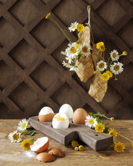 Boiled eggs on wooden stand. Rustic breakfast