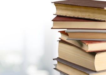 Books collection in pile on  background.