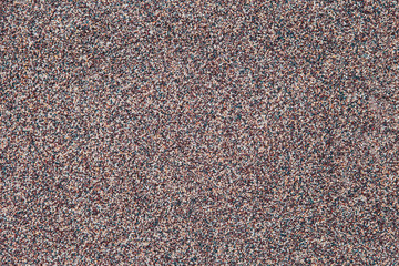 Small stones background wall texture. Asphalt road surface background