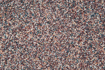Small stones background wall texture. Asphalt road surface background