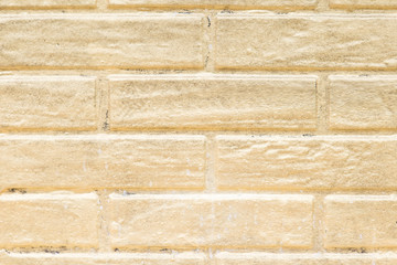 Golden brick wall background. brick wall painted in gold
