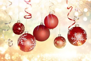 Red shiny decorative Christmas balls on white background