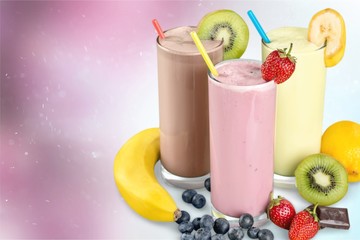 Fruit Smoothies with Straws  Isolated on a White Background