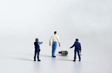 Fototapeta premium The concept of domestic violence. Miniature people.