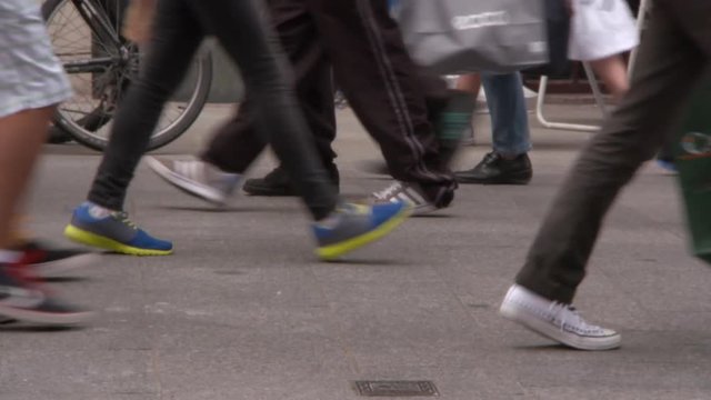 Lockdown: Shoes of People Walking on the Street