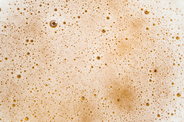 Glass of beer top view with beautiful beer bubbles texture