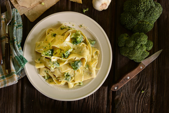 Tagliatelle Pasta With Cheese Sauce And Broccoli