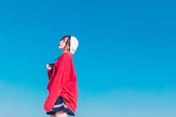 Naklejka premium young woman in blue dress