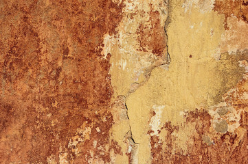 Cracked and peeling paint old wall background.