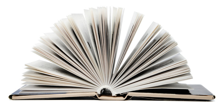 Open book on an isolated white background. Close-up.