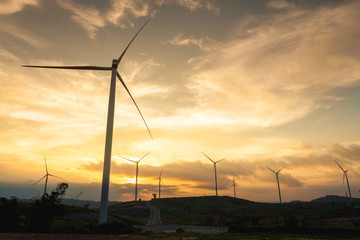 Fototapeta na wymiar Silhouette of wind Turbine in sunset mood