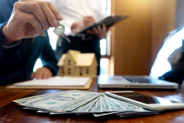 Business man present or try to sell for customer