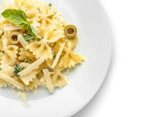 Plate with delicious pasta on white background