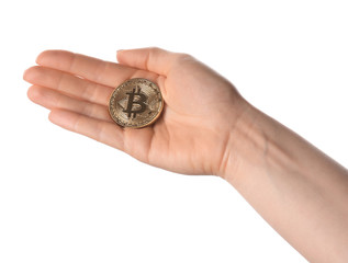 Female hand with bitcoin on white background