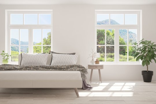 White bedroom with summer landscape in window. Scandinavian interior design. 3D illustration